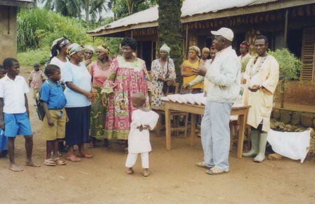 Distributing school items to OVCs