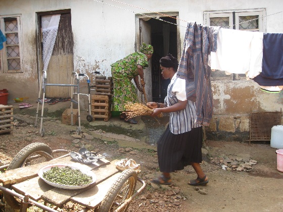 Volunteers helping clean the homes of people living with HIV